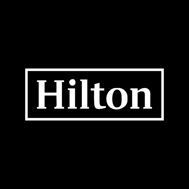 Логотип акции Hilton, HLT